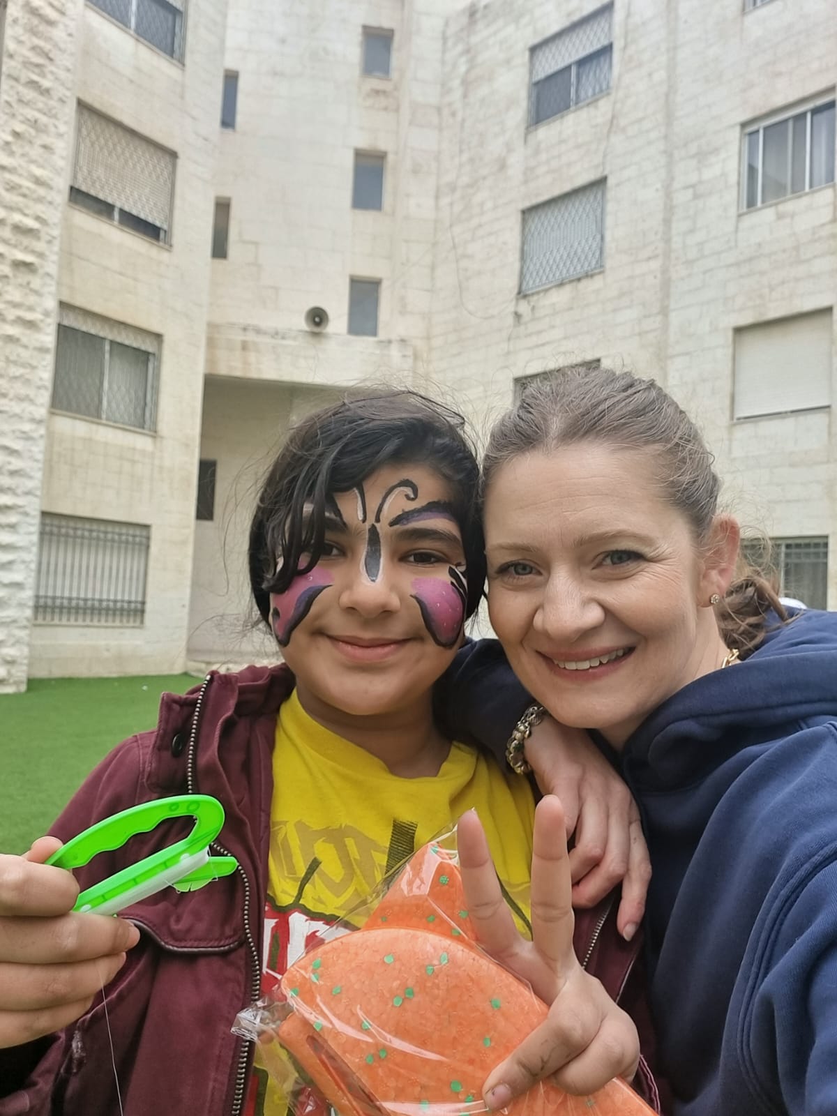 Reem Sandarusi and a kid